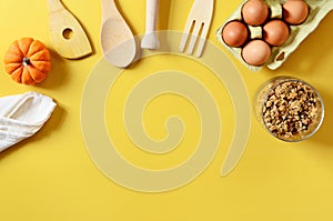 Flat lay with different kitchen and cooking utensils on yellow background. Culinary blog, recipe template, online cooking courses.