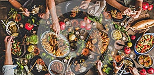 Flat-lay of family feasting with Turkish cuisine foods, wide composition