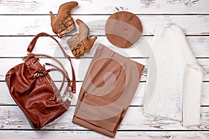 Flat lay of fashion apparel for ladies.