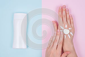 Flat lay flatlay top above high angle overhead close up view photo of lady applying cream on hand isolated on pastel pink blue bac