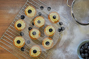 Flat lay food with fresh baked cakes and fruit