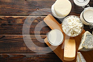 Flat lay. Fresh dairy products and cutting board