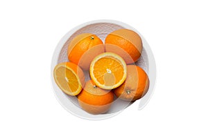 Flat lay of Fresh orange fruit with sliced in plate isolated on white background. Top view with copy space