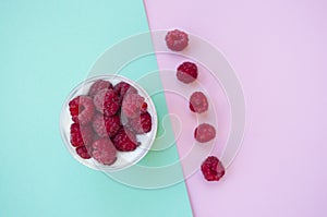 Flat lay of granola with rasberry.