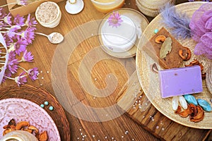 Flat lay handmade organic cosmetics: cream, artisan soap, bath salt