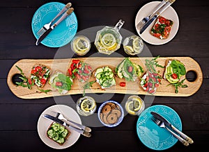 Flat lay of healthy vegetarian dinner table setting.