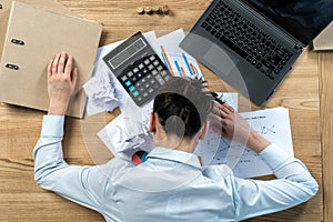 Flat lay high angle above top view calm brunette hair lady in her formalwear she sleep put head on table with work stuff