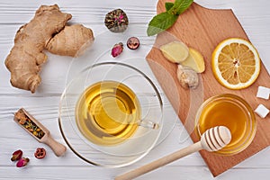 Flat lay honey, lemon, ginger tea.