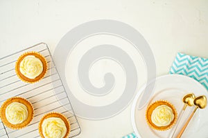 A flat lay image of cupcakes and baked goods