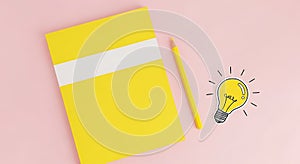 Yellow Notebook, Pencil, Idea Bulb Creative Inspiration Concept