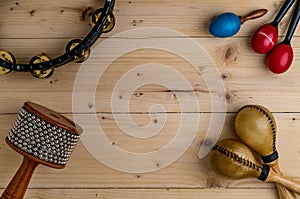 Flat lay of Latin percussion on wood desk