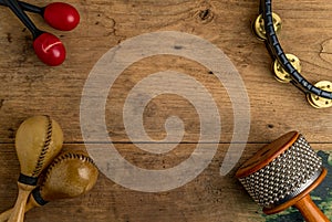 Flat lay of Latin percussion on wood desk