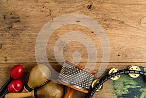 Flat lay of Latin percussion on wood desk