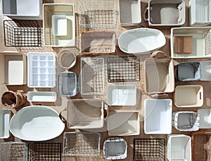 Flat lay of Marie Kondo`s storage boxes, containers and baskets with different sizes and shapes