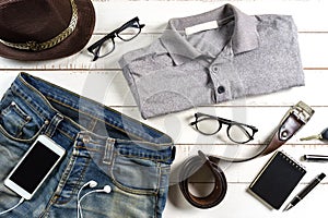 Flat lay of men casual fashion outfits on wooden background