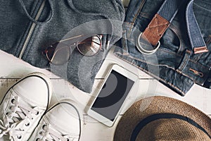 Flat lay of men casual fashion outfits on wooden background