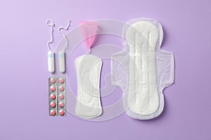 Flat lay with menstruation period concept on background, top view