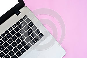 Flat Lay of minimalist silver laptop with white display for copy space