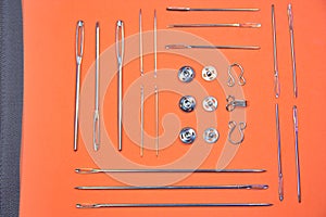 Flat lay of needles and clasps of various types