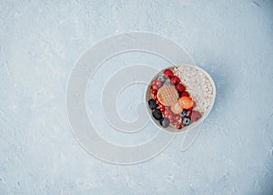 Flat Lay Oatmeal with berries in bowl