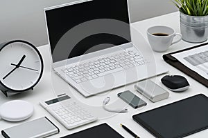 Flat lay of office desktop and gadgets