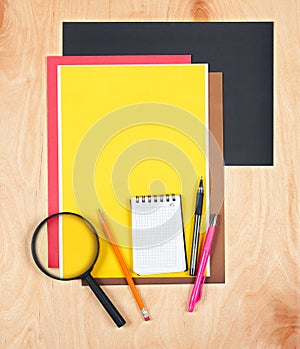 Flat lay office tools and supplies. Stationery on wood background. Flat design of workspace, workplace. Top view of desk backgroun