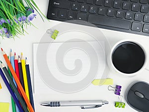 Flat lay office workspace desk with coffee,blank notebook, electronic devices and computer. organizer mockup concept for blog or