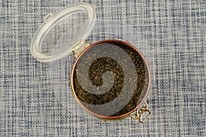 Flat Lay open tea coffee tin with latch