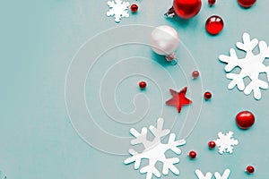 Flat lay photo with Christmas decorations on blue background. Xmas greeting card, banner.