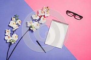 Flat lay photo of a creative freelancer woman workspace desk with copy space background.