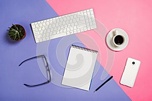 Flat lay photo of a creative freelancer woman workspace desk with copy space background.