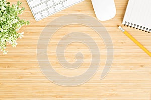 Flat lay photo of office desk with mouse and keyboard ,Top view workpace on bamboo wood table and copy space