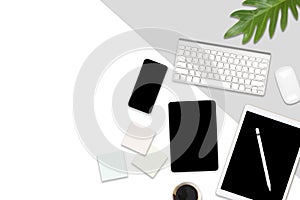 Flat lay photo of office table with laptop computer, digital tablet, mobile phone and accessories. on modern background. Desktop o