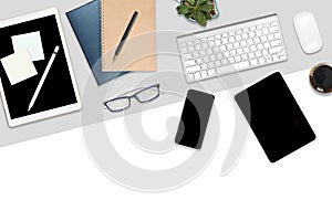 Flat lay photo of office table with laptop computer, digital tablet, mobile phone and accessories. on modern background. Desktop o