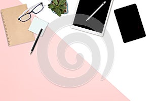 Flat lay photo of office table with laptop computer, digital tablet, mobile phone and accessories. on modern background. Desktop o