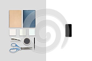 Flat lay photo of office table with laptop computer, digital tablet, mobile phone and accessories. on modern tone background.