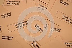 Image from above of a table full of electoral envelopes for the senate in Spain photo