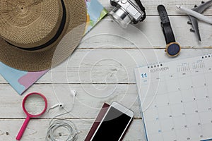 Flat lay of planing travel with technology background concept