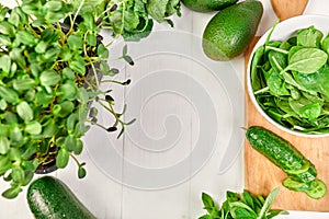 Flat lay of series of assorted green vegetables, fresh organic raw produce