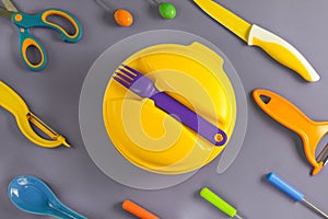 Flat lay set of colour plastic ware