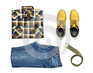 Flat lay set Men`s casual clothing, blue jeans, checkered shirt, yellow nubuck shoes, strap isolated items on white background to