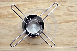 Flat lay of stainless steel measuring cups