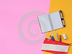 Flat Lay Stationary on Pink and yellow background