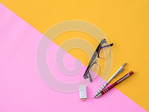 Flat Lay Stationary on Pink and yellow background