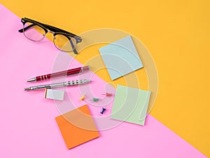 Flat Lay Stationary on Pink and yellow background