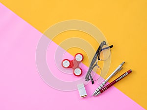 Flat Lay Stationary on Pink and yellow background