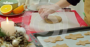 Flat lay. Step by step. Rolling out gingerbread cookie dough to bake Christmas cookies.