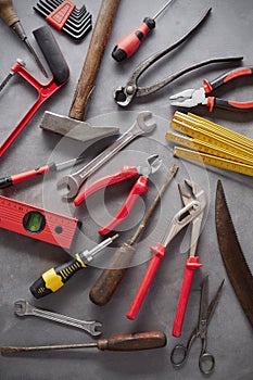 Flat lay still life of old and modern hand tools