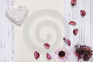 Flat lay stock photography purple flower petals glass bottle heart wood craft