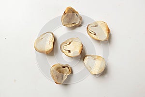 Flat lay straw mushroom with slice isolated on a white background